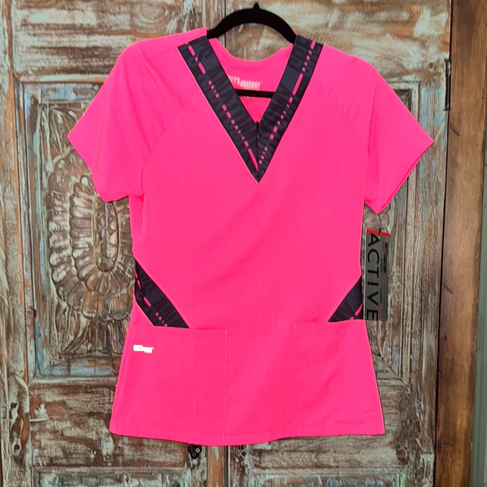 Greys Anatomy pink and black V-neck stretch scrub top. NWT. XS